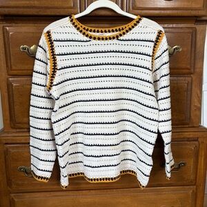 Striped White and Navy Sweater with Orange Accents